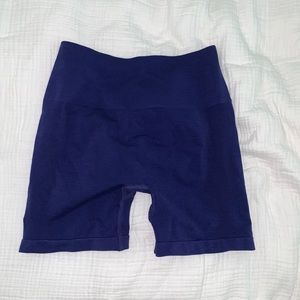 True indigo Alphalete 4.5 amplify shorts